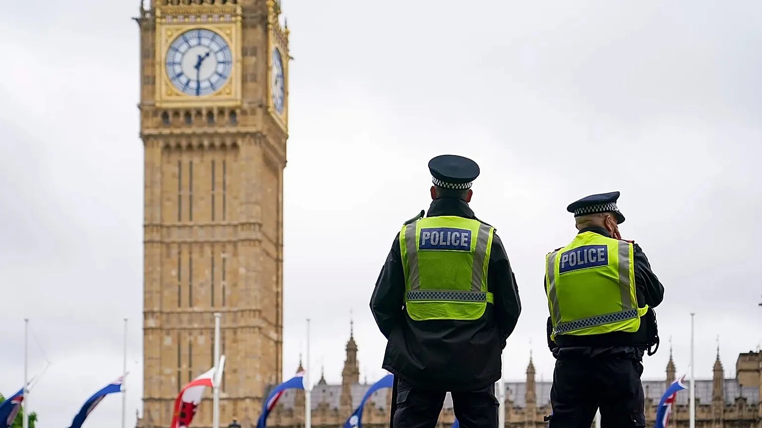 Two police officers patrol Parliament Square, backdropped by the Elizabeth Tower, commonly known as Big Ben, in London, Wednesday, June 3, 2026.
