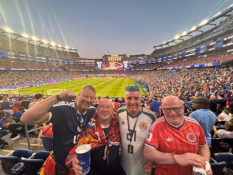 John Finnigan (second to right) attending Scotland vs Haiti