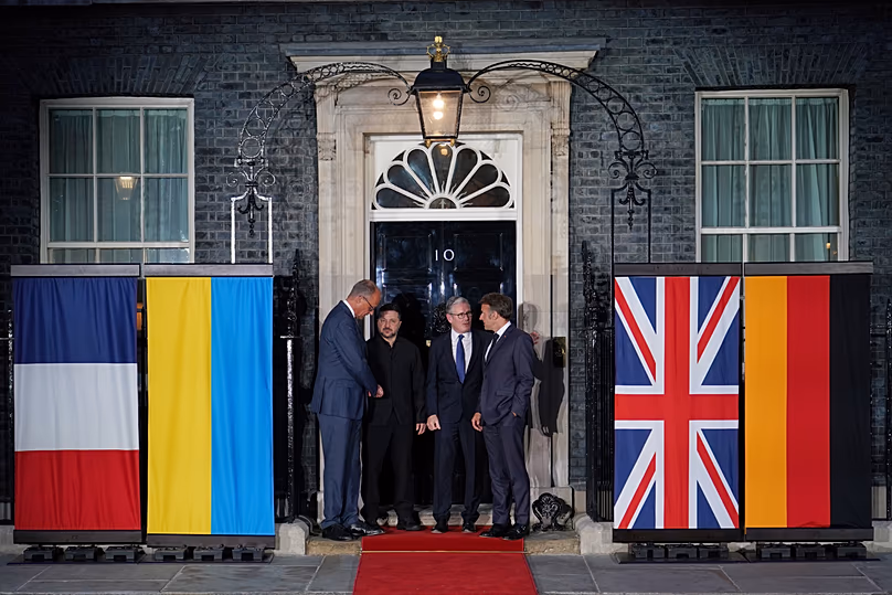 Friedrich Merz, Volodymyr Zelenskyy, Keir Starmer and Emmanuel Macron on the doorstep of 10 Downing Street in London, 7 June, 2026