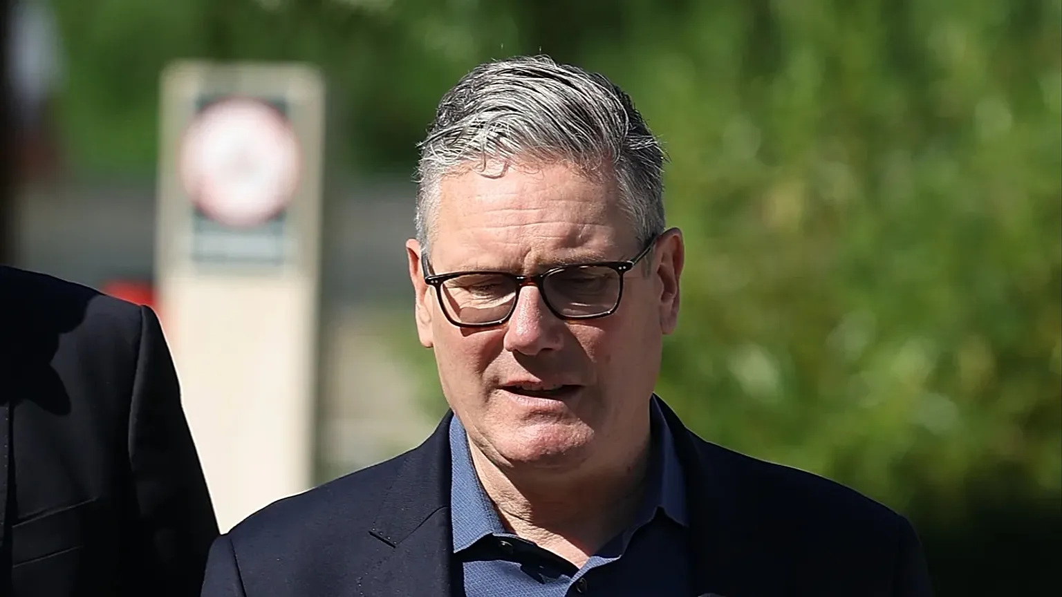 Britain's Prime Minister Keir Starmer walks, as he visits a housing development in north London, Friday, 19 June 2026. 