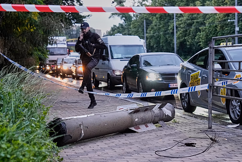 A missile fragment lies on the street following Russia's air attack in Kyiv, 15 June, 2026