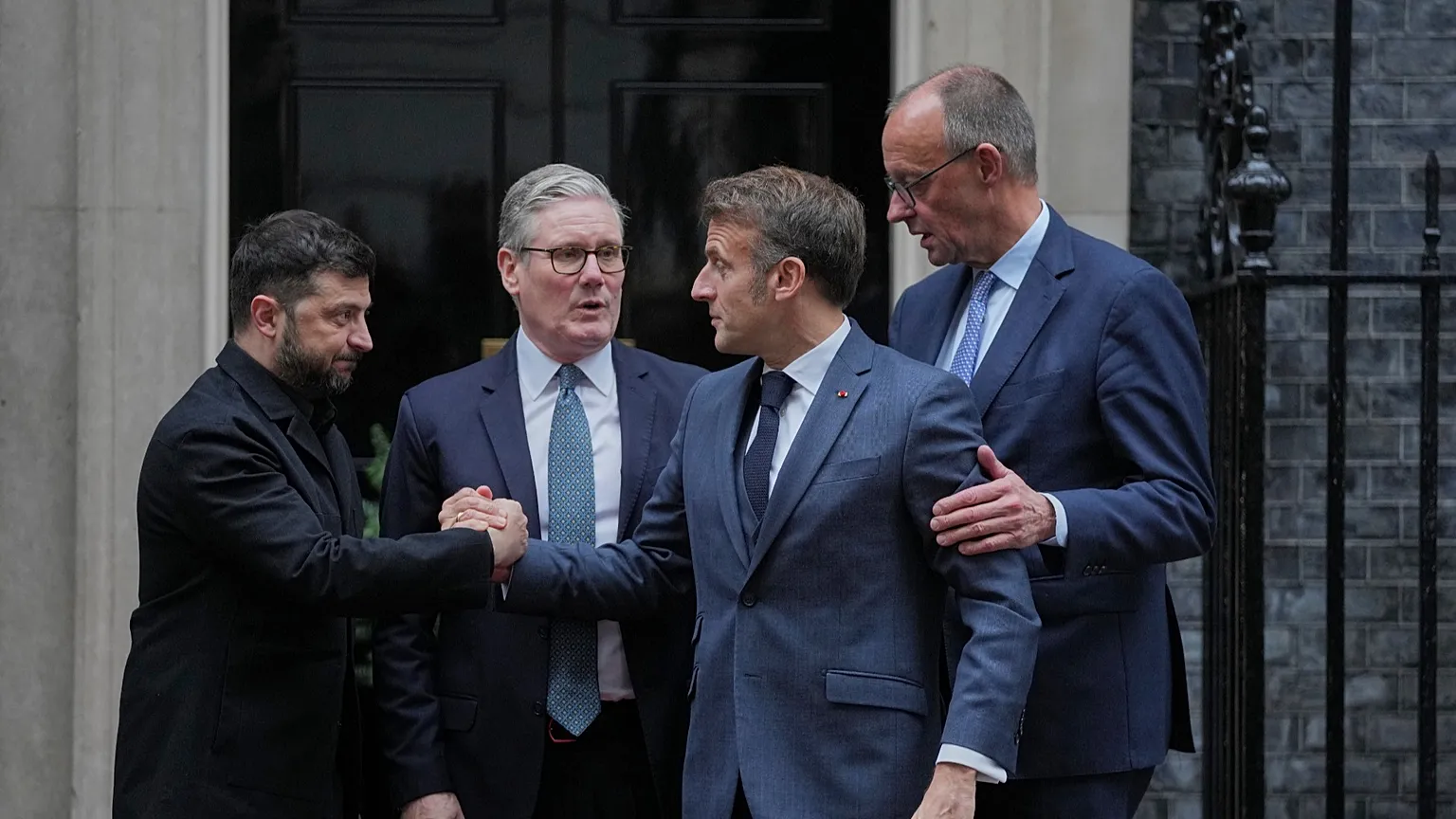 Ukraine's President Volodymyr Zelenskyy flanked by European leaders at 10 Downing Street, London, 8 December, 2025.
