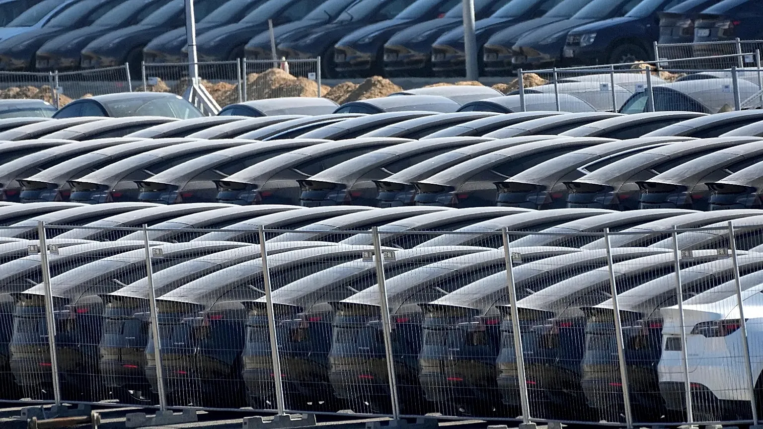 Tesla cars are parked at the new Tesla Gigafactory for electric cars in Gruenheide near Berlin, Germany, Tuesday, March 22, 2022.