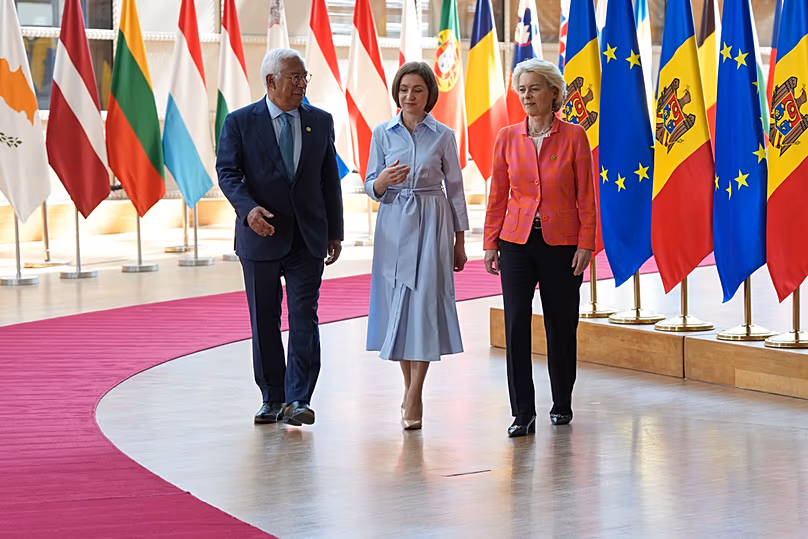 EU Council President Antonio Costa, Moldova's President Maia Sandu and EU Commission President Ursula von der Leyen arrive for the EU-Moldova summit in Brussels, June 22, 2026