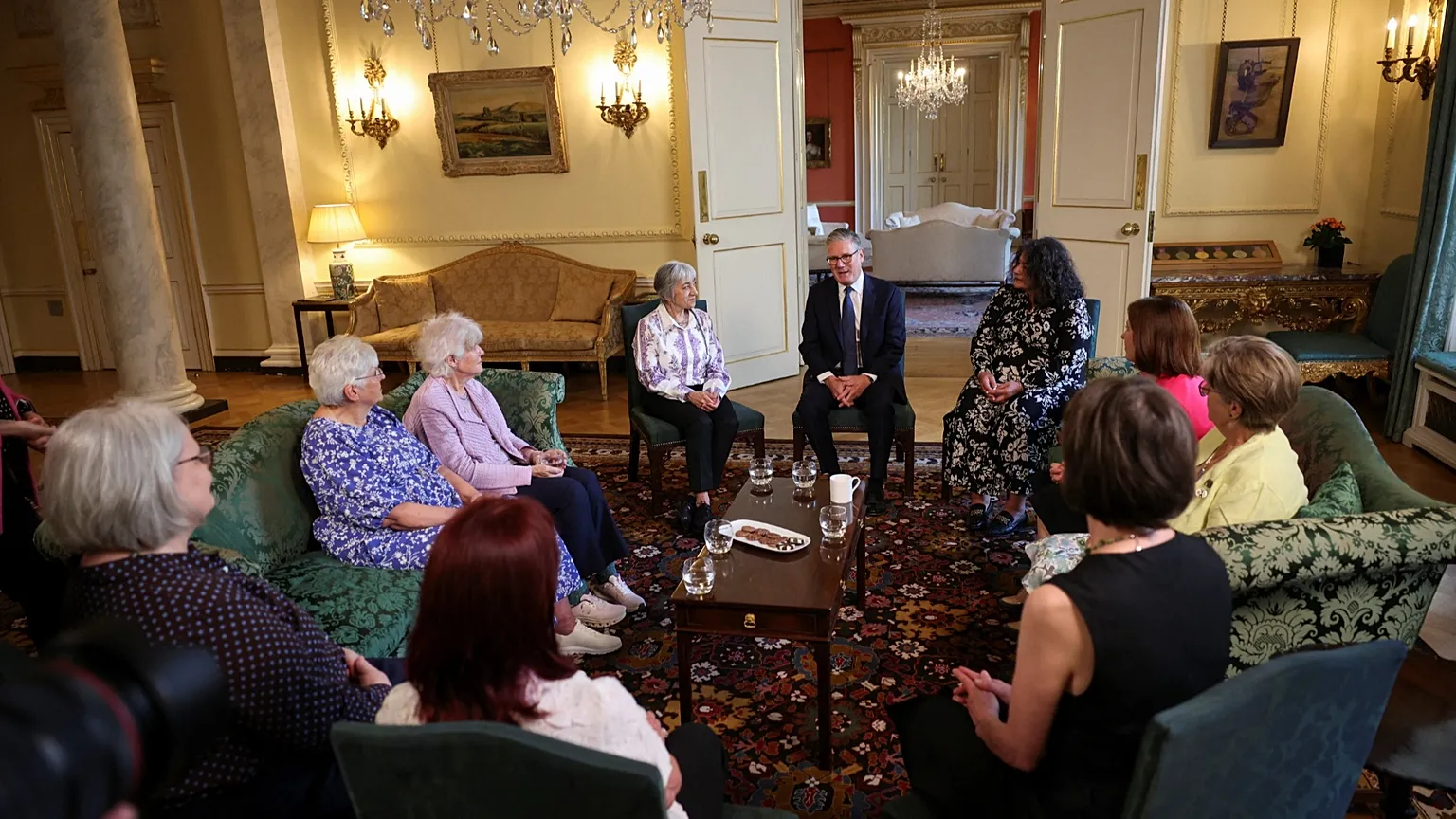 Britain's Prime Minister Keir Starmer, center, attends a meeting with campaigners to discuss historical forced adoption, at Downing Street, in London, Thursday July 2, 2026.
