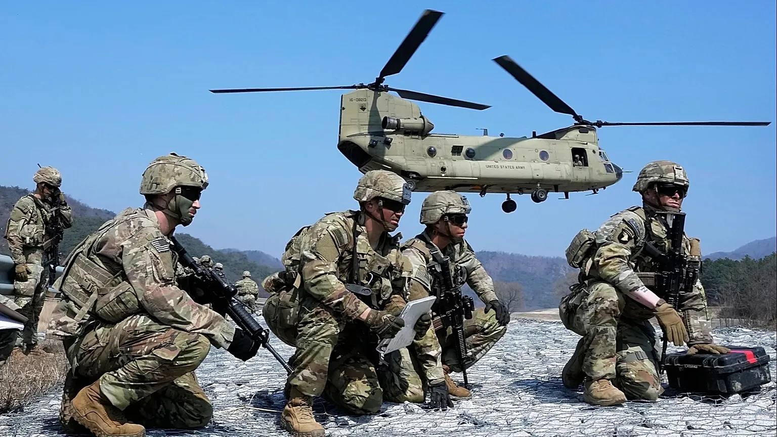 FILE - US Army soldiers wait to board CH-47 Chinook helicopter during a joint military drill between South Korea and the United States Pocheon, South Korea, March 19, 2023. 