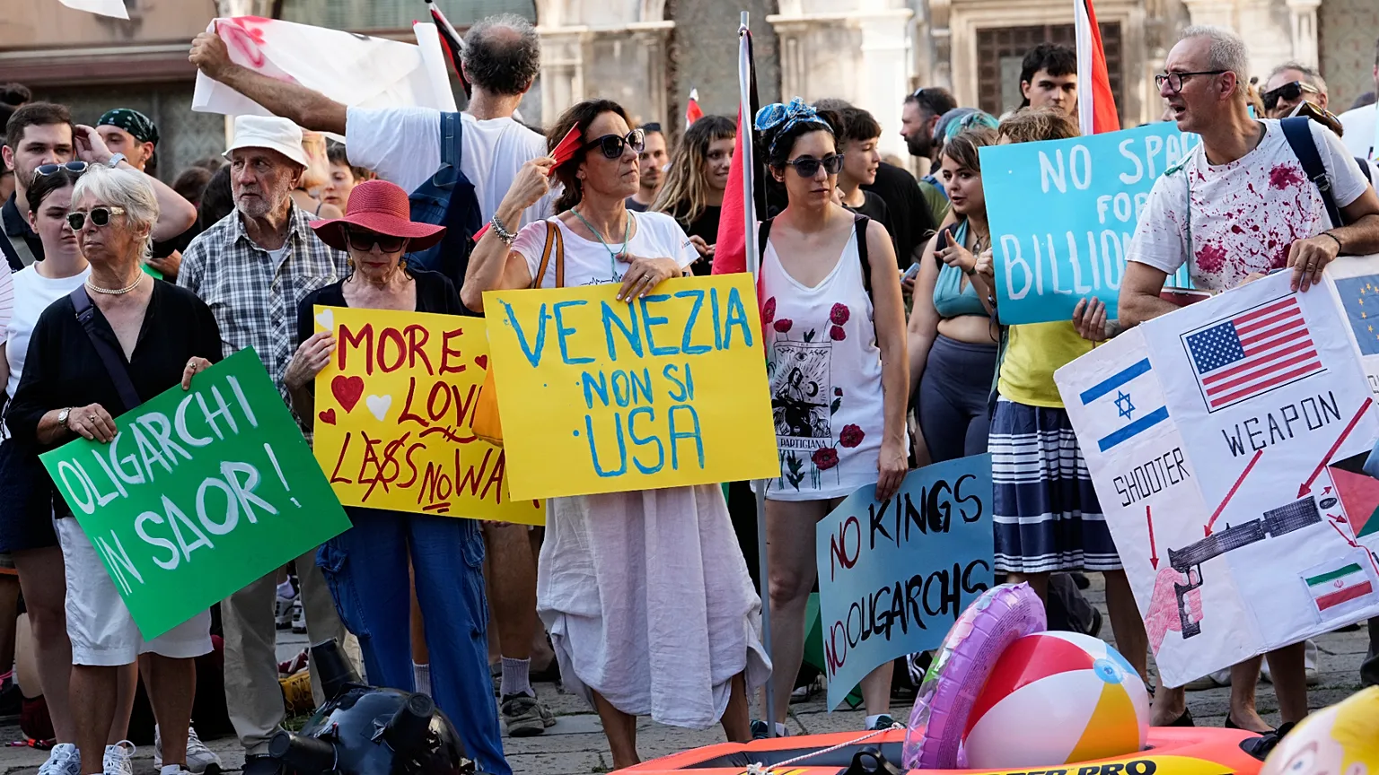 Demonstrators gather to protest against U.S. Ambassador Tilman Fertitta's superyacht 'Boardwall' presence in Venice, Friday, 17 July, 2026. (AP Photo/Luca Bruno)