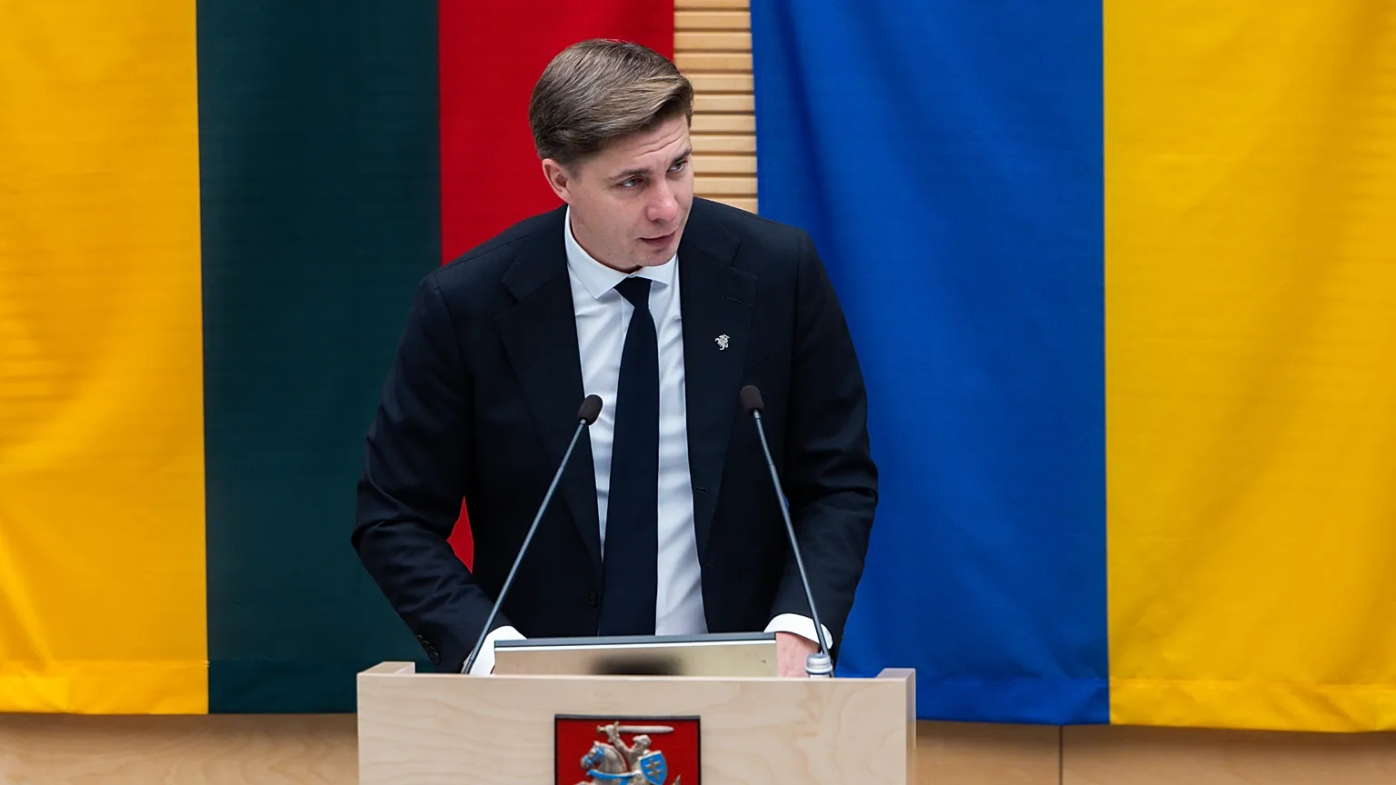 The freshly appointed prime minister Mindaugas Sinkevičius presents the programme to the Lithuanian parliament Seimas on Tuesday.