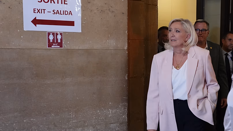 Far-right leader Marine Le Pen arrives at the courtroom for the verdict of her appeals trial in Paris, 7 July, 2026
