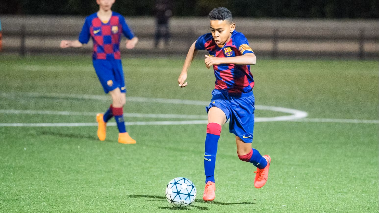 Lamine Yamal, de niño, en la cantera del Barça.