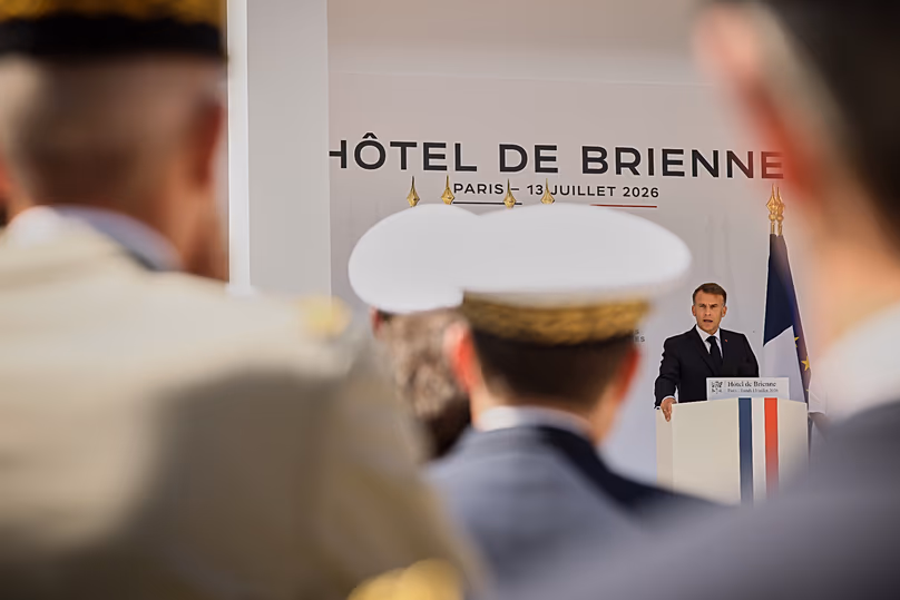 French President Emmanuel Macron delivers his address to the armed forces on the eve of the Bastille Day parade at the Ministry of Defense in Paris, Monday, July 13, 2026. 
