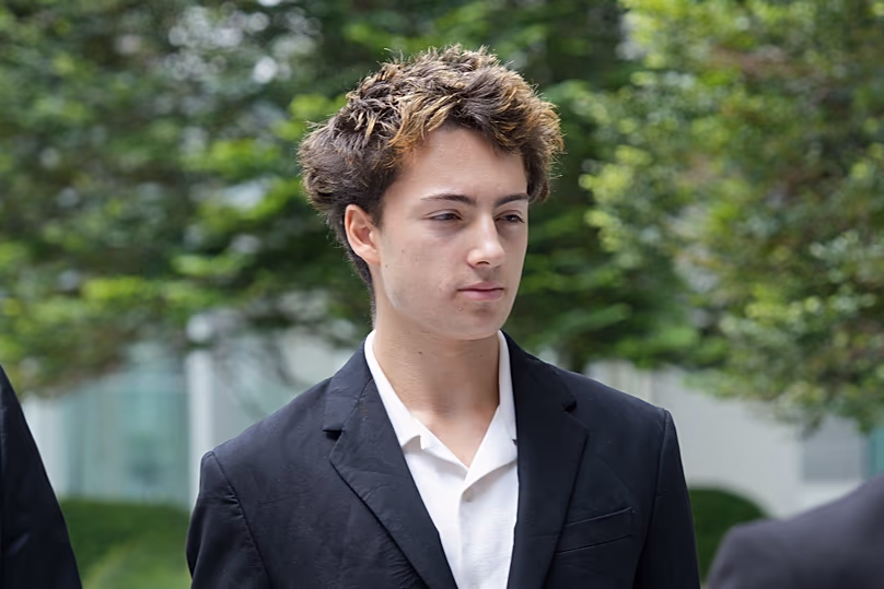 Didier Gaspard Owen Maximilien arrives at the State Courts building in Singapore, 13 July, 2026