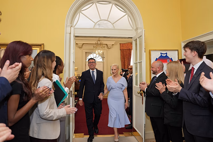 Burnham and his wife Marie-France van Heel were greeted by staff after entering Downing Street for the first time. 20 July, 2026.