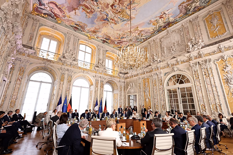 Chancellor Merz and French President Macron attend the plenary session of the Franco-German Ministerial Council at Augustusburg Palace in Brühl, Germany, Friday, July 17, 2026