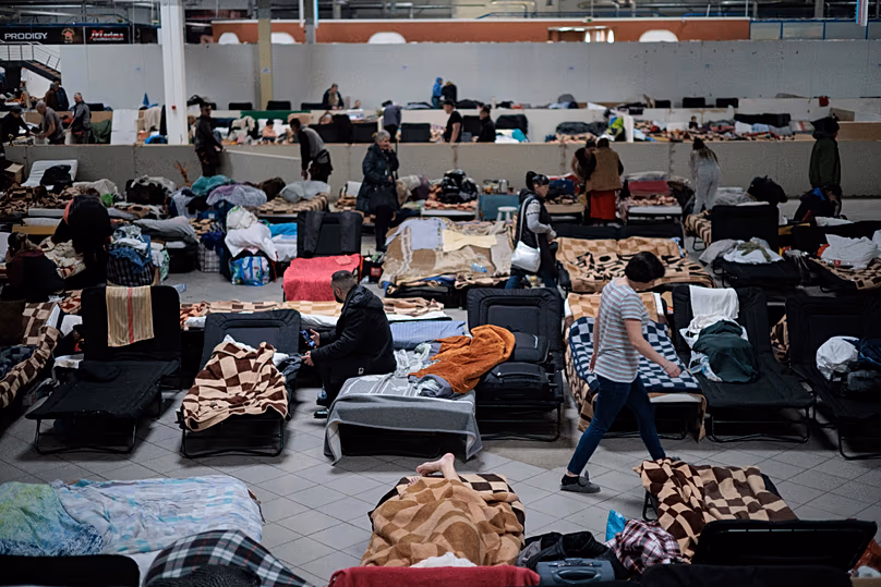 Ukrainian refugees rest at a refugee centre in Nadarzyn, 14 February, 2023