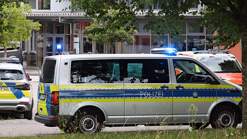 Police vehicles are parked in front of the Welfen High School in Schongau, 8 July, 2026