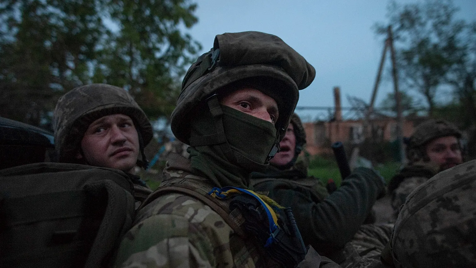 File photo: Ukrainian soldiers sit in a pickup truck at their frontline position near Bakhmut, 16 June 2023.