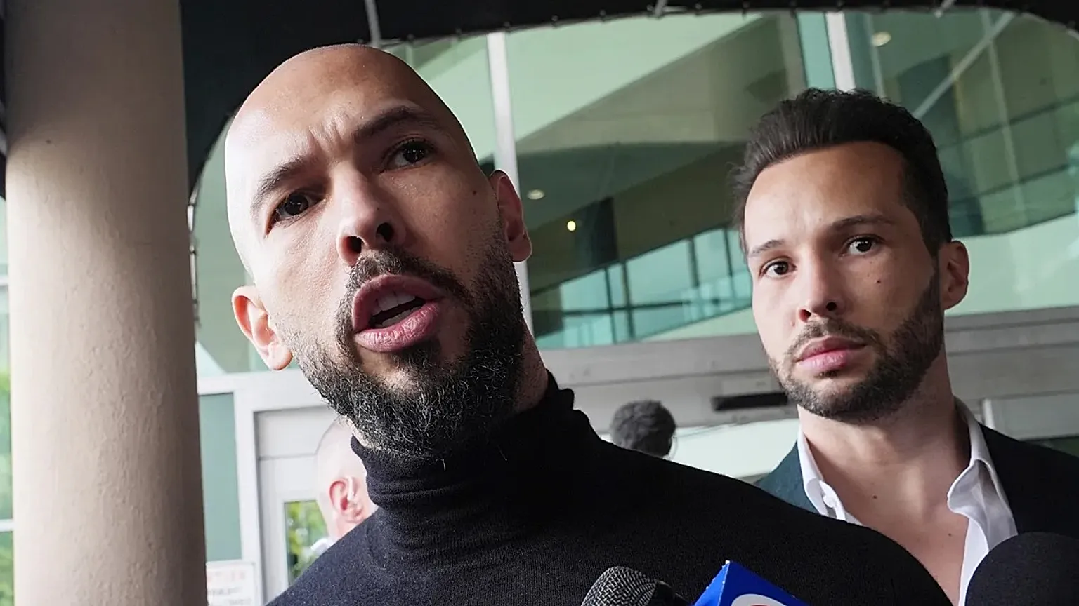 Andrew (left) and Tristan (right) Tate returned to the US after a Romanian court lifted a travel ban while they await trial over charges including rape. FILE