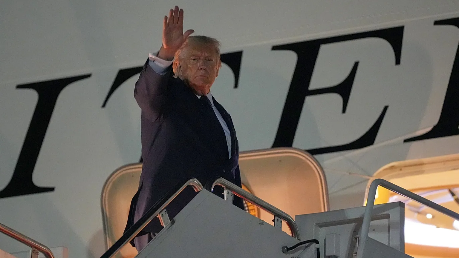US President Donald Trump waves as he boards Air Force One, Monday, 6 July, 2026.
