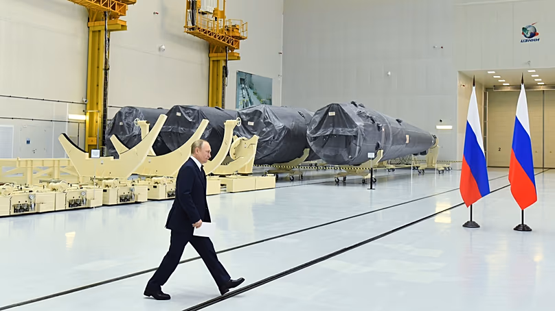 Russian President Vladimir Putin walks at a rocket assembly factory outside the city of Tsiolkovsky, Russia, Tuesday, 12 April, 2022. 