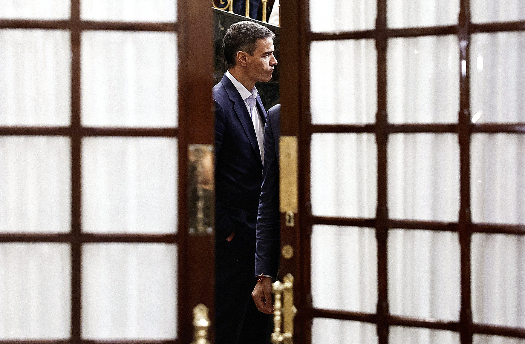 El presidente del Gobierno, Pedro Sánchez, momentos antes de abandonar el hemiciclo durante el último pleno ordinario del día 25 de junio.