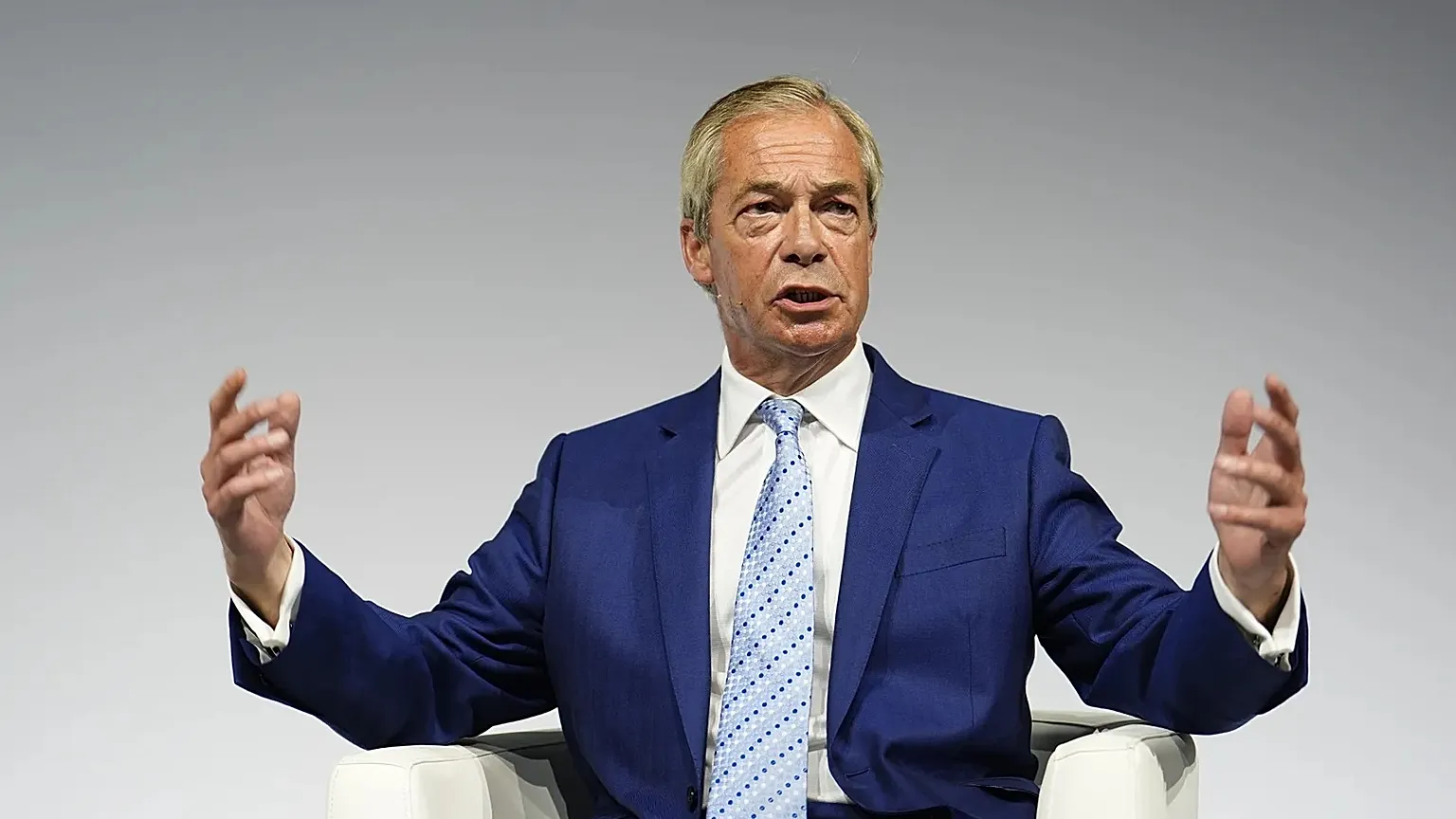 Reform UK leader Nigel Farage gestures during a fireside chat at the Alliance for Responsible Citizenship (Arc) annual conference, at Olympia London, Wednesday June 24, 2026.