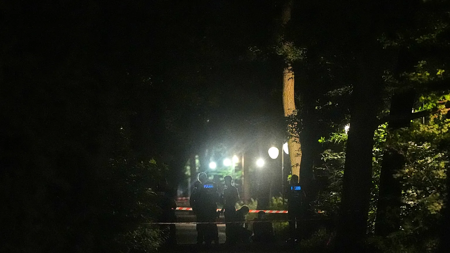 On Sunday morning, 26 July 2026, police comb Berlin's Tiergarten after the Christopher Street Day celebrations were called off.