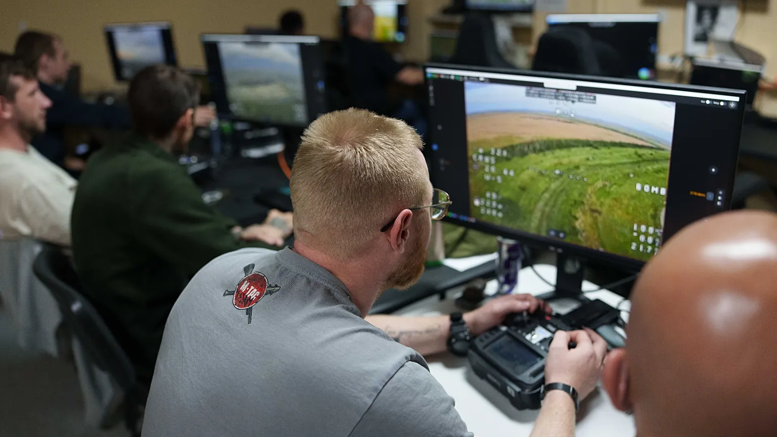 A serviceman with Ukraine’s K-2 brigade flies a midrange drone toward Russian positions on the front line, from a command center in Ukraine on June 20, 2026. 
