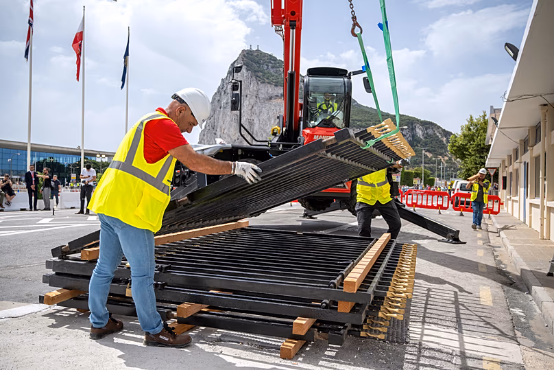 Workers remove the fence separating Gibraltar from Spain in La Línea de la Concepción, 15 July, 2026