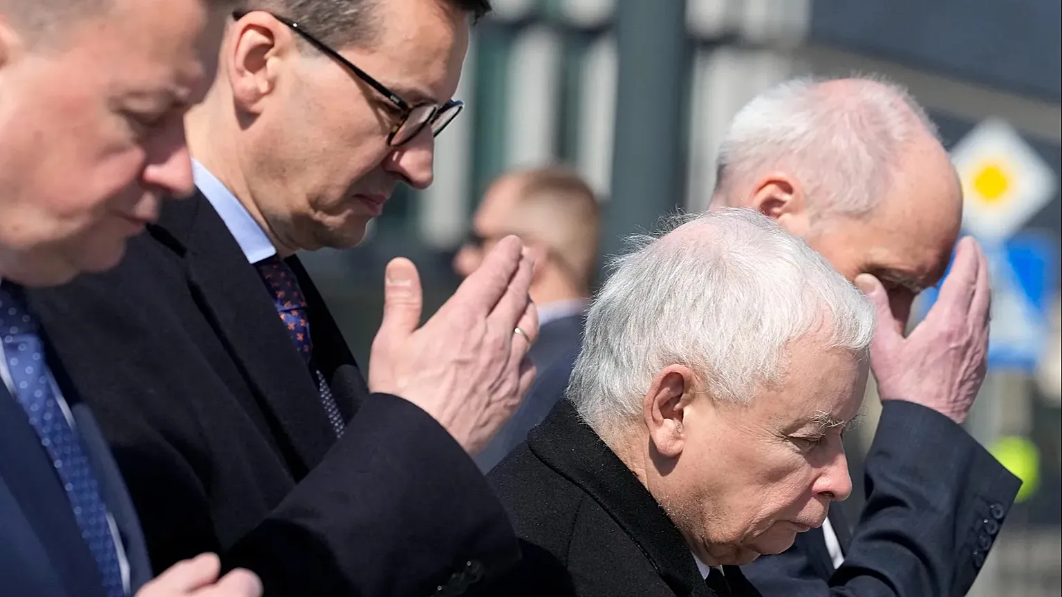 Jaroslaw Kaczynski (second right) the head of Law and Justice, and former prime minister Mateusz Morawiecki (left).