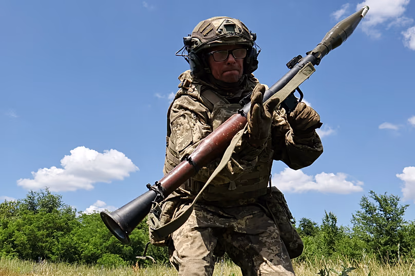 A Ukrainian soldier practices military skills at a training ground near the frontline in the Zaporizhzhia region, Ukraine, Saturday, June 20, 2026