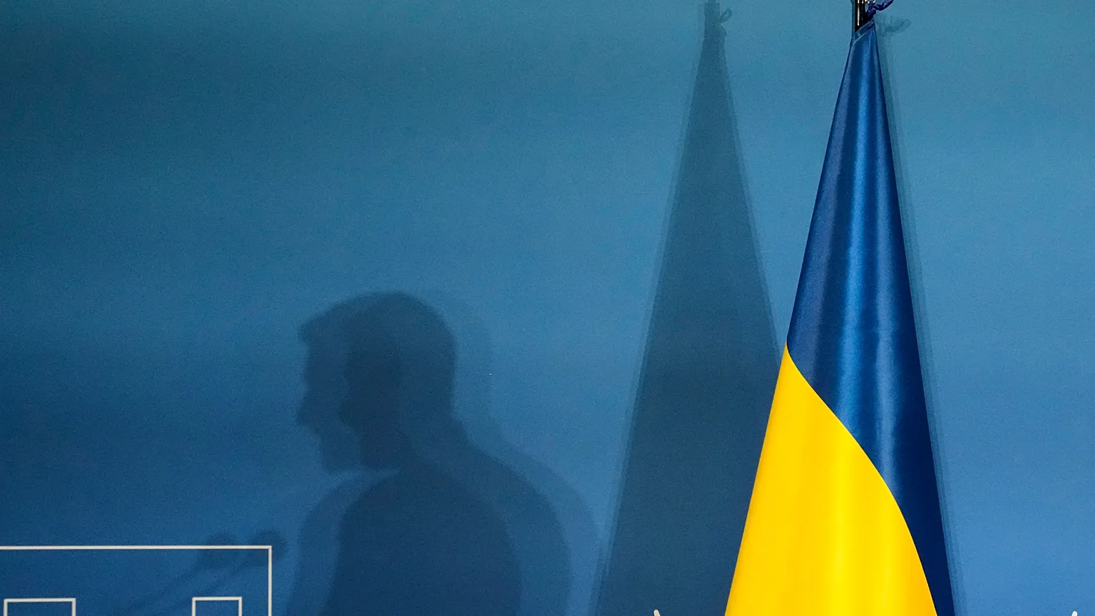 FILE: The shadow of Ukraine's President Volodymyr Zelenskyy is projected on a wall at La Nuvola convention center in Rome, Thursday, July 10, 2025