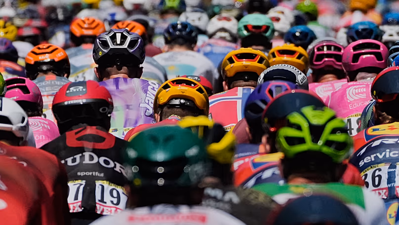The pack rides during the third stage of the Tour de France cycling race with start in Granollers and finish in Les Angles, 6 July, 2026