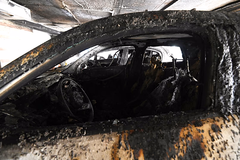 Burned vehicles following firebomb attacks that apparently targeted members of Greece's governing New Democracy party in Thessaloniki, 1 July, 2026