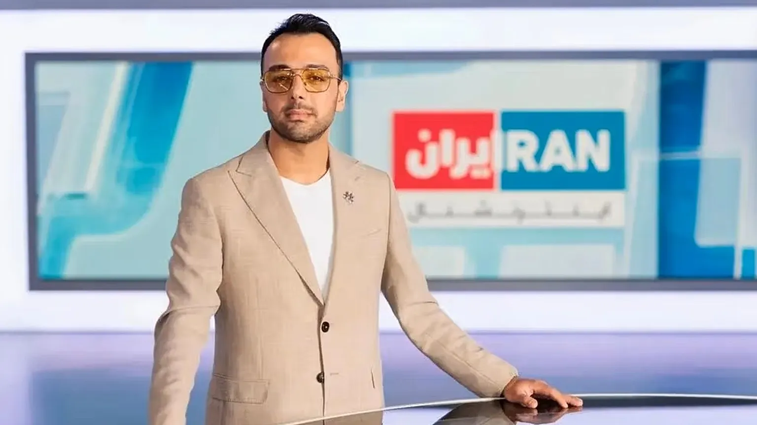 Presenter with Iran International television Pouria Zeraati in the studio
